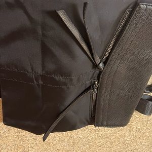A black botkier back pack